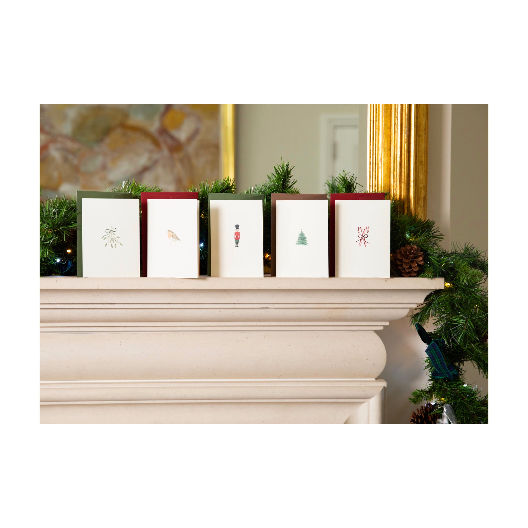 Luxury Christmas Card by Memo Press with a watercolour illustration of a Robin Redbreast and comes with a scarlet envelope made in Britain