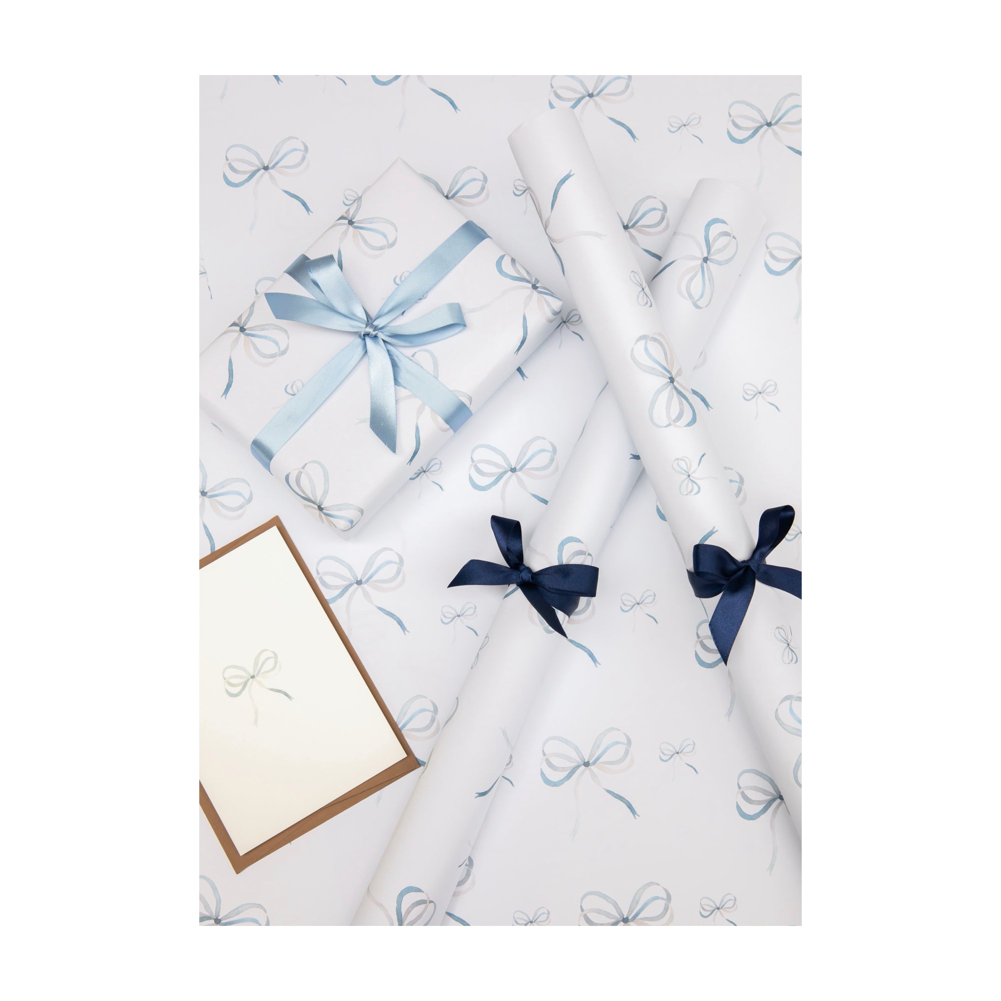 Lake blue bow wrapping paper by Memo Press